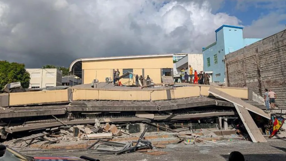 Multiple buildings collapse in Port Vila, Vanuatu due the impact of a 7.3 magnitude earthquake on 17 December. Photo credit: Getty Images