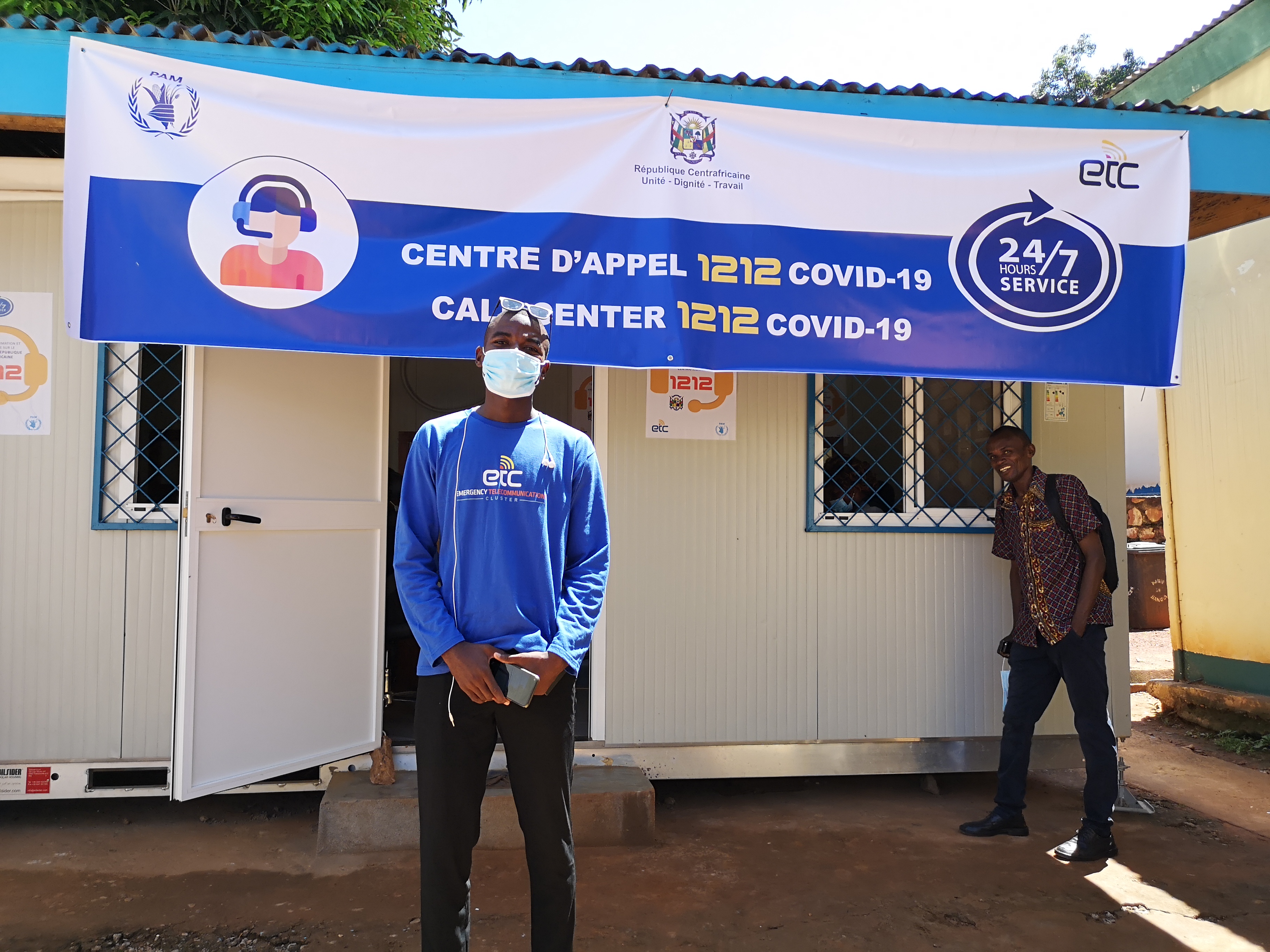 Technical support officer Labon outside the 24-hour call centre. Photo: WFP/Elizabeth Millership